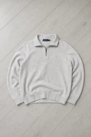 The same ralph lauren quarter-zip, rendered by Reframe