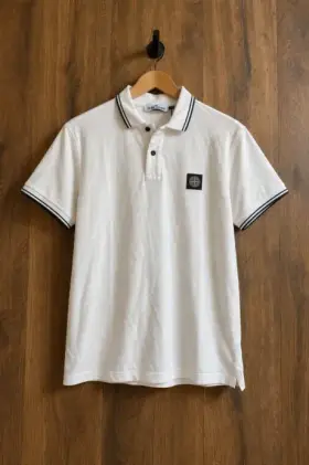 A polo rendered by Reframe, On a Hanger — Front layout