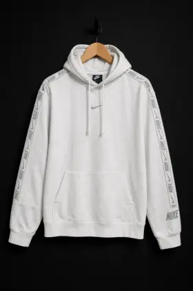 Hoodie on a hanger, photographed by Reframe