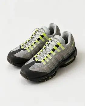 A pair of trainers rendered by Reframe — Pair — Angled layout
