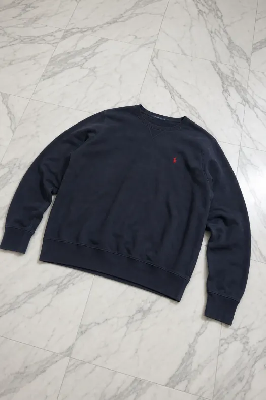 The same navy jumper, rendered by Reframe
